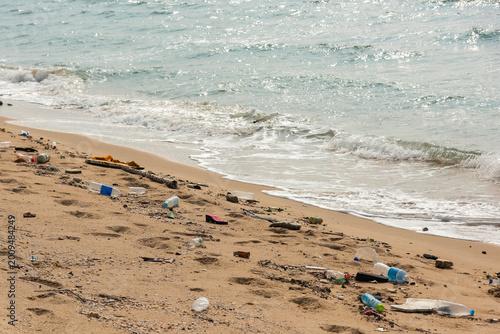 Plastic pollution, Many plastic debris on the beautiful tropical beach