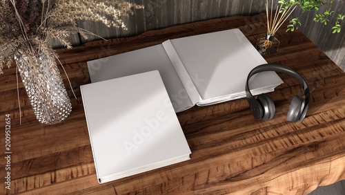 Photos Blank hardcover book mockup on wooden desk with headphones,  dried plants and diffuser, soft light interior