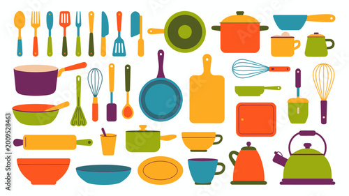 Photography A colorful collection of kitchen utensils and cookware is displayed including sp