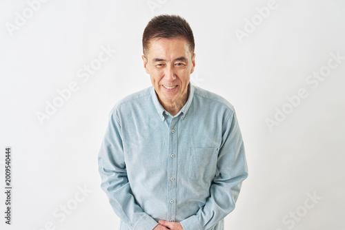 Tableau sur toile 白背景でお辞儀する男性
