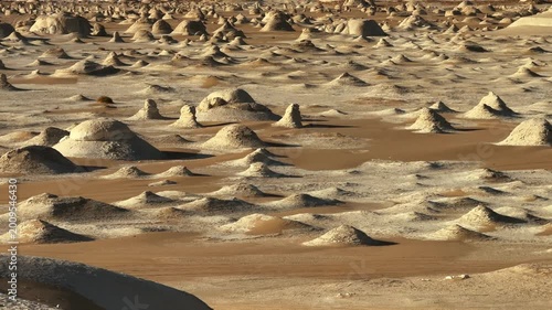 Many chalk rock formations creating surreal Sahara landscape in White Desert