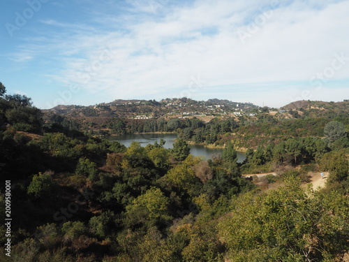 Lake Hollywood Park with scenic reservoir and dry hills landscape in Los Angeles, California, USA