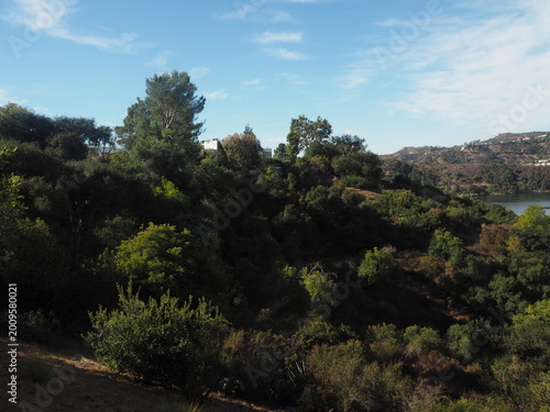 Lake Hollywood Park with scenic reservoir and dry hills landscape in Los Angeles, California, USA