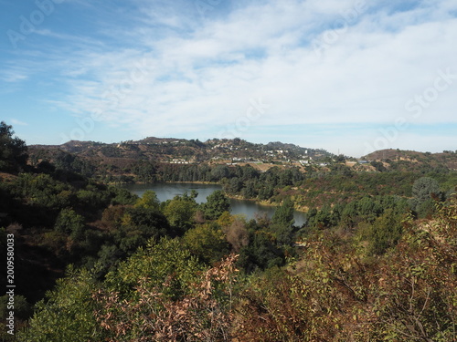 Lake Hollywood Park with scenic reservoir and dry hills landscape in Los Angeles, California, USA