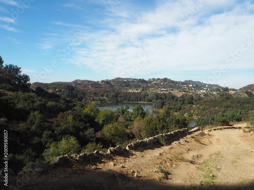Lake Hollywood Park with scenic reservoir and dry hills landscape in Los Angeles, California, USA