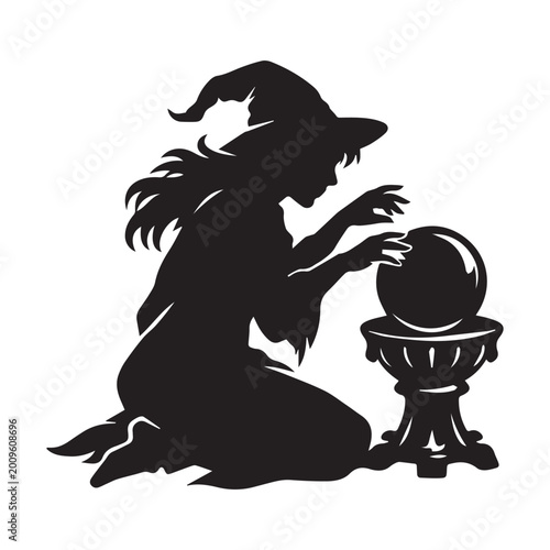 Foto Silhouette of a witch fortune teller gazing into a crystal ball