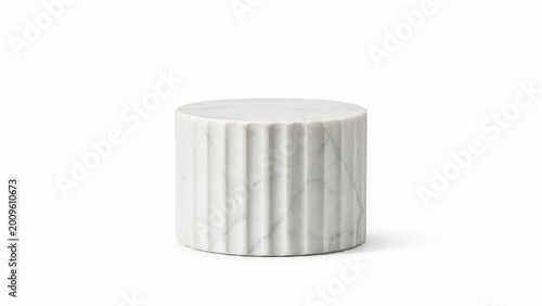 Short perfectly cut cylinder section of a classic Greek marble column featuring elegant carved vertical lines serving as a minimalist display plinth smooth pristine white stone