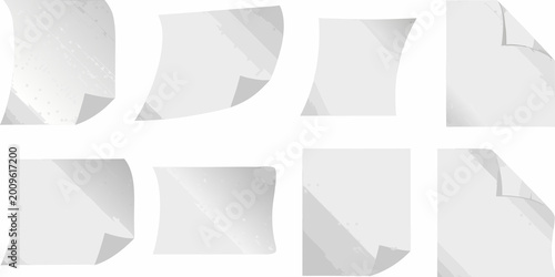 Photography Twelve white paper sheets in motion curling and fluttering against a white backg