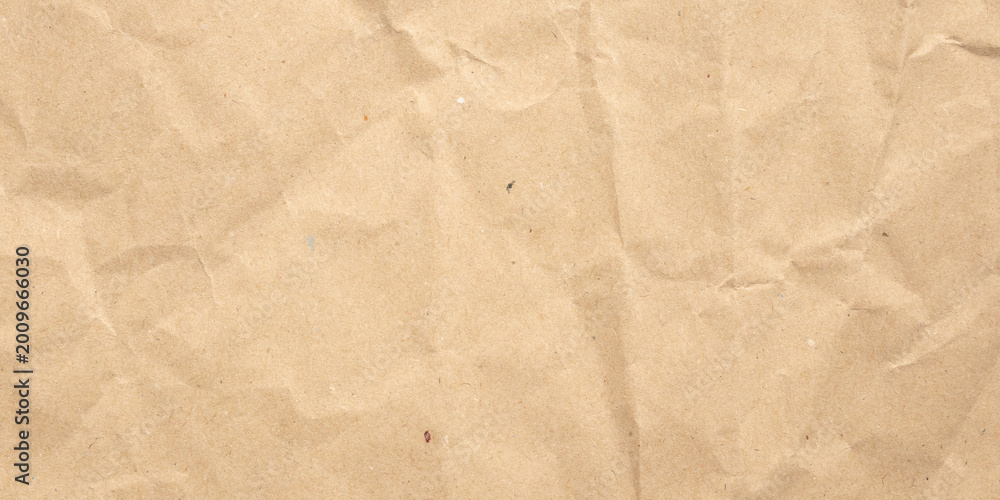 Fototapeta premium Abstract crumpled and creased recycle brown paper texture background