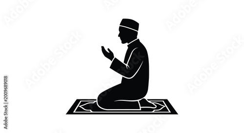 Valokuva silhouette of a praying man on a rug black and white