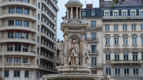 Baroque Fountain with Statue in Place des Jacobins, Lyon, France Surrounded by Historic Buildings
