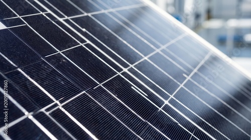 Close-up of solar panel reflecting sunlight for renewable energy.