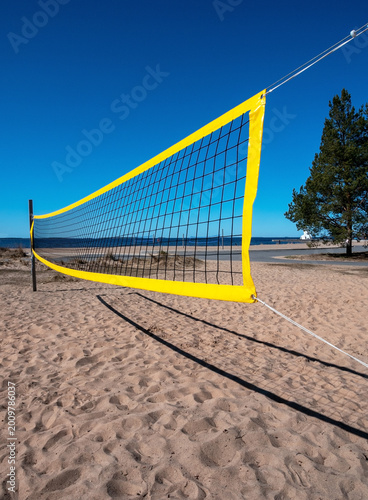 yellow beach volleyball net against clear blue sky outdoors, Nallikari Oulu Finland