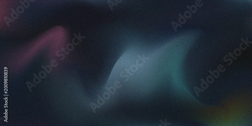 An abstract dark background featuring soft, ethereal light gradients in shades of blue, purple, and teal, enhanced with a subtle film grain texture.