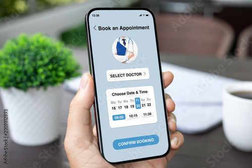 Man holding phone with medical doctor appointment booking app interface
