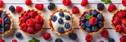 Berries tartlets, fresh strawberry, blueberry pastries, fruit tartlet cakes, french berry dessert, raspberry