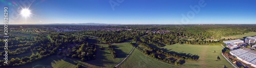 Tableau sur toile Bright sun aerial panorama over Frankfurt countryside and skyline