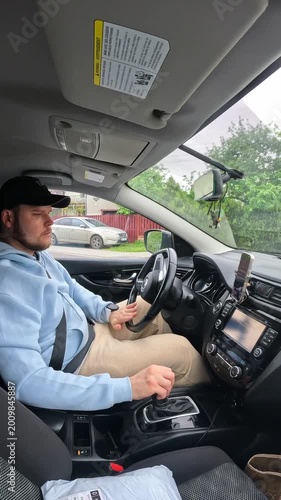 Man driving car from interior perspective