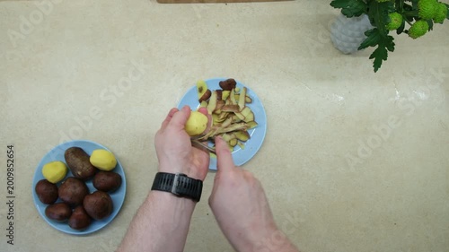 Peeling Potatoes in the Kitchen