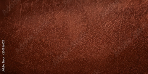 Photos A textured close-up showcases the rich, inviting warmth of a distressed, brown leather