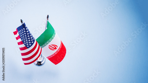 Konstfotografi Flags of America and Iran close up isolated on background