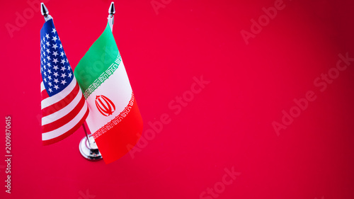 Fotografía Flags of America and Iran close up isolated on background