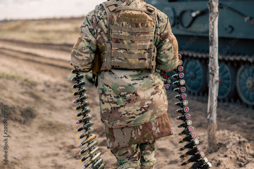 Fototapeta premium machine gun belt for air defense in the hands of a soldier