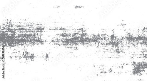 Fotografía Abstract distressed grunge texture with scattered grey speckles and smudges on w