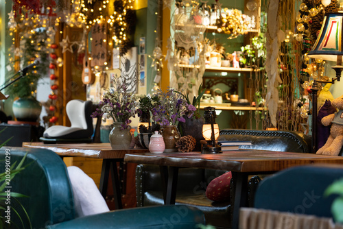Fotografi Cozy coffee shop interior with warm ambient lighting