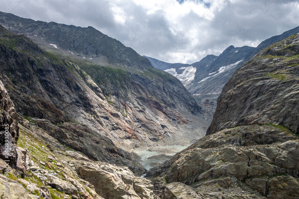 Fototapeta premium Glacial valley of Tre-La-Tete with rocky cliffs in Les Contamines-Montjoie, France