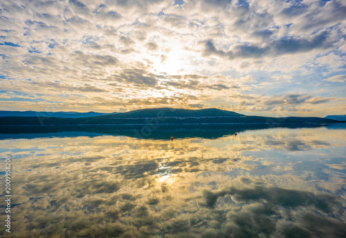 Golden Sunset Reflection Over Calm Adriatic Sea in Neum