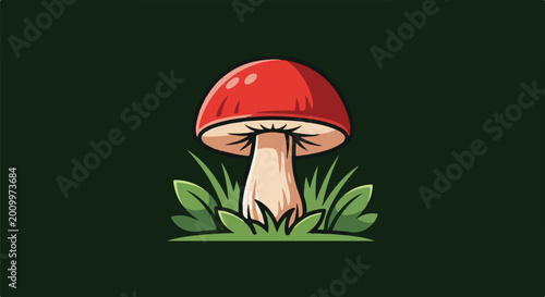 A red capped mushroom with a thick stem sits amongst green grass
