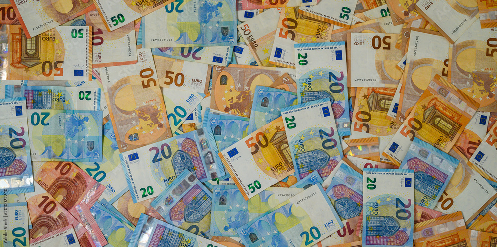 Fototapeta premium Assorted Euro Banknotes Spread on White Background