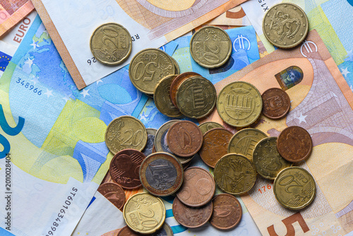 Money background euro banknotes and coins close-up