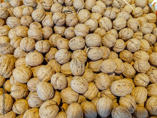 walnuts in their shells. Background.