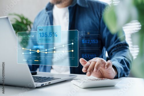 Tableau sur toile Business professional analyzing ROI performance and payback period on financial