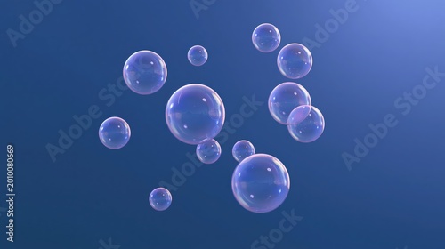 Transparent soap bubbles floating against a clear blue sky background.