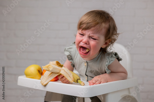 Canvas Print Portrait of a little girl crying
