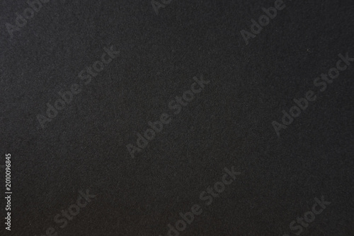 Black paper texture background. Black blank page