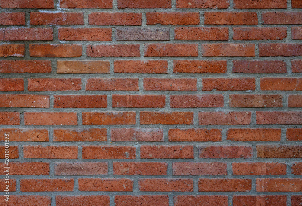 Naklejka premium Red Brick Wall with Texture as Background