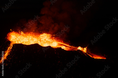 Εκτύπωση καμβά Aerial view into a volcanic crater spewing molten magma