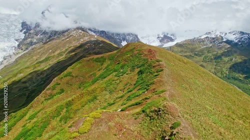 Hiker Walking on Mountain Ridge in Svaneti Caucasus, Georgia