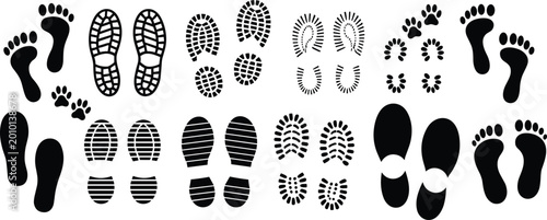 Collection of diverse human footprints, shoe sole patterns, animal paw prints, and horseshoe tracks silhouettes for design and illustration use