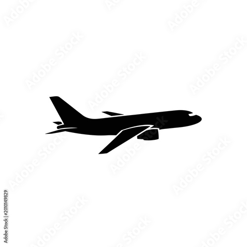 Silhouette of a Passenger Airplane Flying in the Sky.