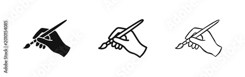 Artist hand holding paintbrush icons set for creative painting and artistic design themes.