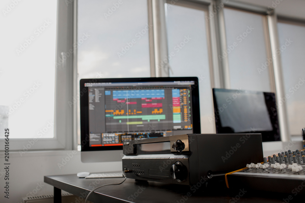 Fototapeta premium Closeup Sound Amplifier Connect and Audio Mixer n recording studio. Music Equipment Concept Background.