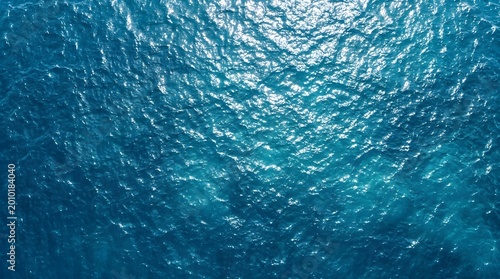 Water Surface Texture with Blue Ocean Waves for Summer Background