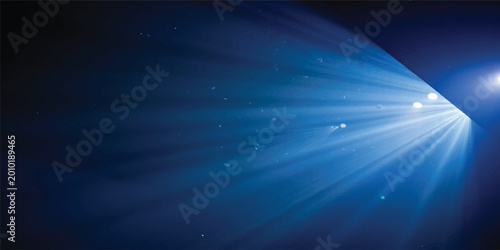 Bright blue abstract background featuring a radiant star burst with glowing light rays and energy beams shining across a celestial sky design backdrop