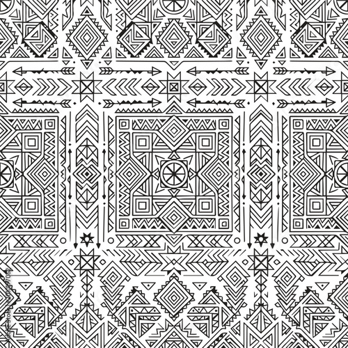 Seamless tribal ethnic pattern with geometric motifs and symbols