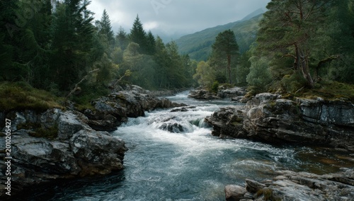 Majestic Scottish Highlands River Flowing Through Rocky Terrain.
